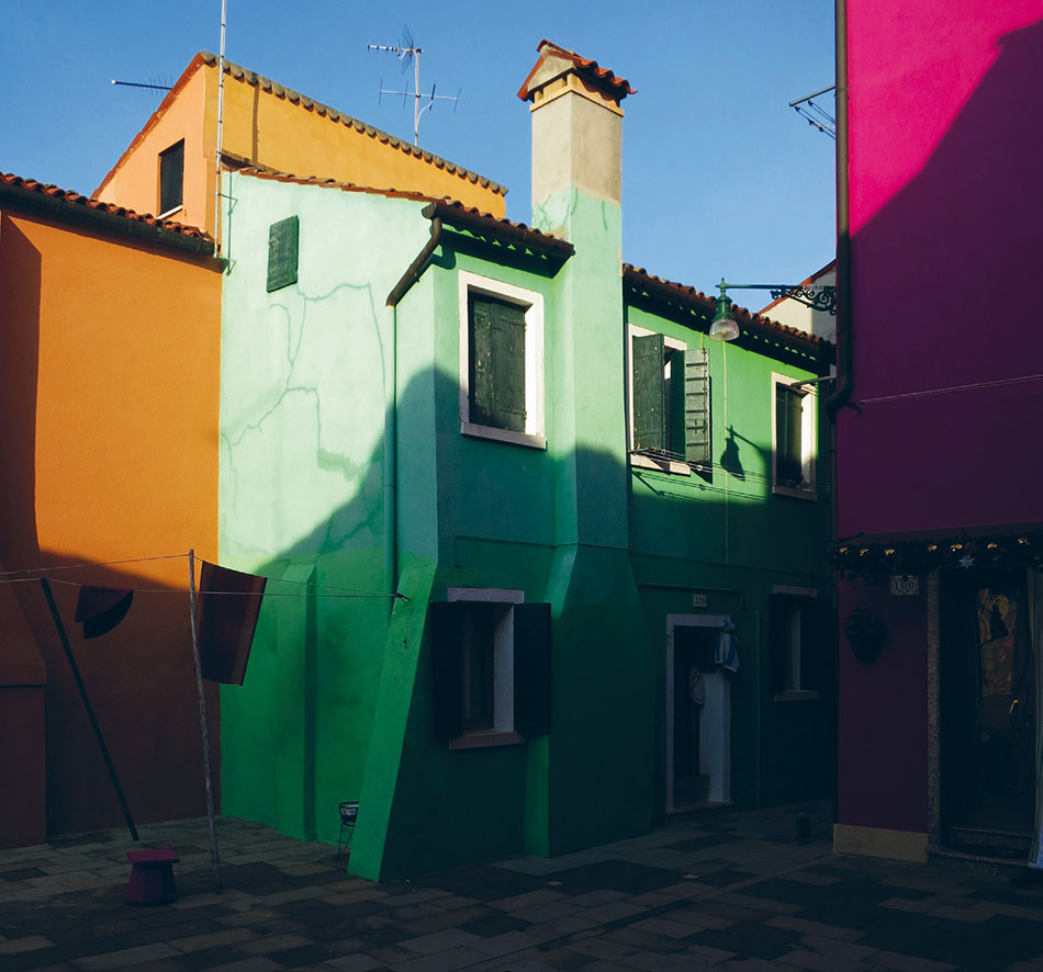 Farbige Häuserwände auf Burano - grün und orange